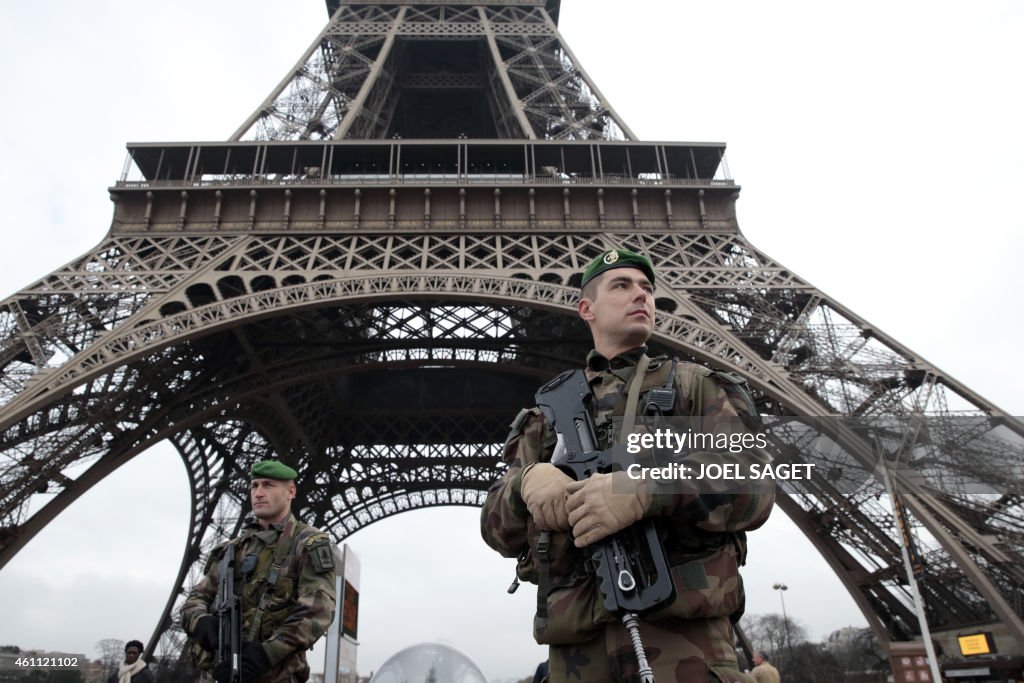 TOPSHOT-FRANCE-ATTACKS-MEDIA