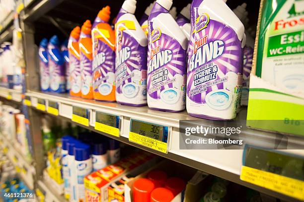 Liquid crystal displays show prices of bottles of Cillit Bang cleaning products, produced by Reckitt Benckiser Group Plc, inside a wholesale store...