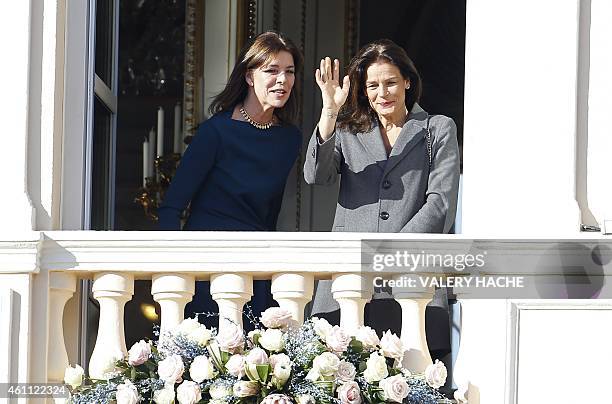 Princess Caroline of Hanover and Princess Stephanie of Monaco appear on the balcony the Monaco Palace on January 7, 2015 in Monaco. Residents of the...