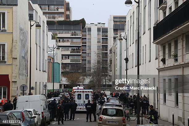 General view of the scene after gunmen have attacked french satirical weekly 'Charlie Hebdo' at 10, Rue Nicolas Appert on January 7, 2015 in Paris,...