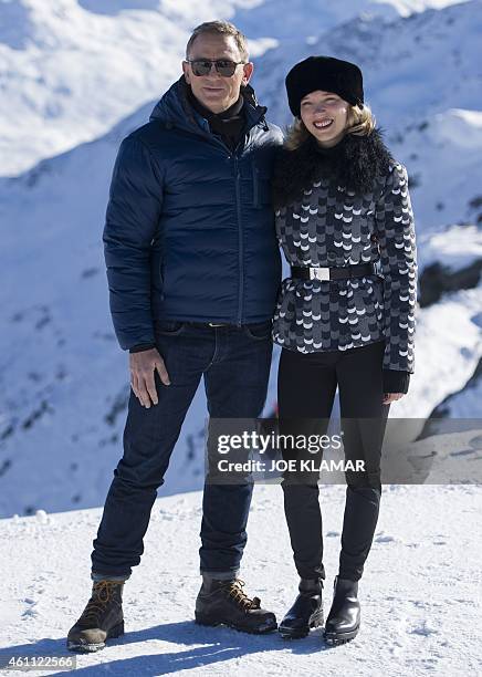 British actor Daniel Craig poses with actress Lea Seydoux of France in front of a Tyrolean Alps panorama during a photo call of the new James Bond...