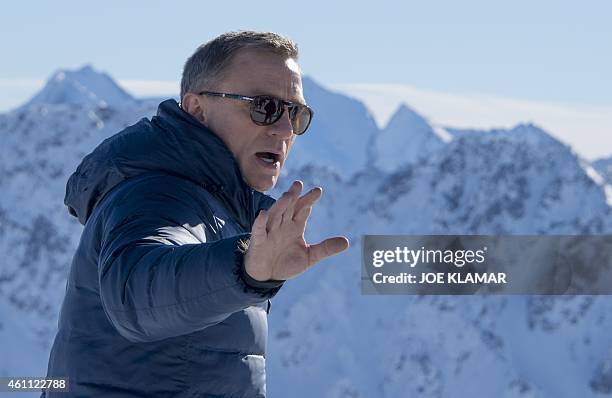 British actor Daniel Craig poses in front of a Tyrolean Alps panorama during a photo call of the new James Bond film 'SPECTRE' in the Austrian ski...