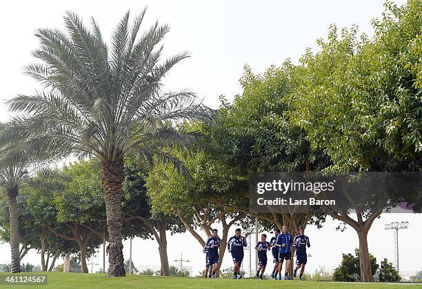 Christian Fuchs, Roman NEustaedter, Kaan Ayhan, Sead Kolasinac and Adam Szalai of Schalke 04 run next to a training session at day 3 of the Bayern...