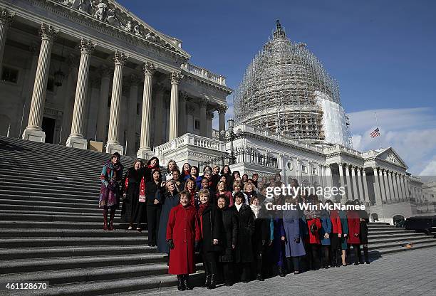The 65 House Democratic women elected to the 114th Congress gather on the steps of the U.S. Capitol for a group photo January 7, 2015 in Washington,...
