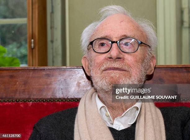French cartoonist Pierre de Barrigue de Montvallon, aka Piem, poses after the announcement of the death of his cartoonist friends Cabu, Wolinski,...