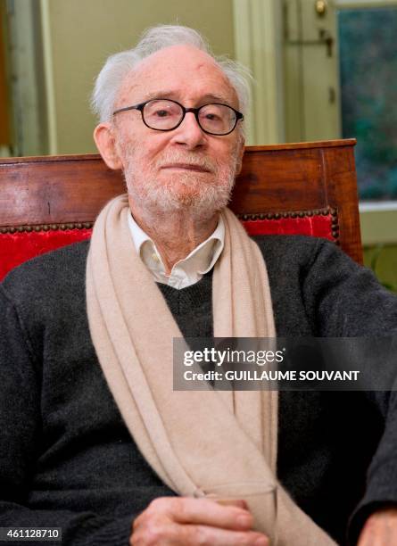 French cartoonist Pierre de Barrigue de Montvallon, aka Piem, poses after the announcement of the death of his cartoonist friends Cabu, Wolinski,...