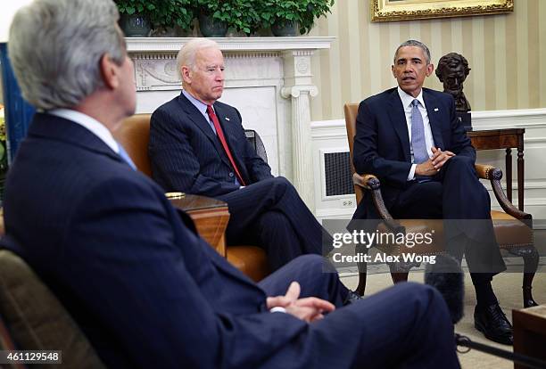 President Barack Obama speaks as he meets with Vice President Joseph Biden , and Secretary of State John Kerry in the Oval Office of the White House...