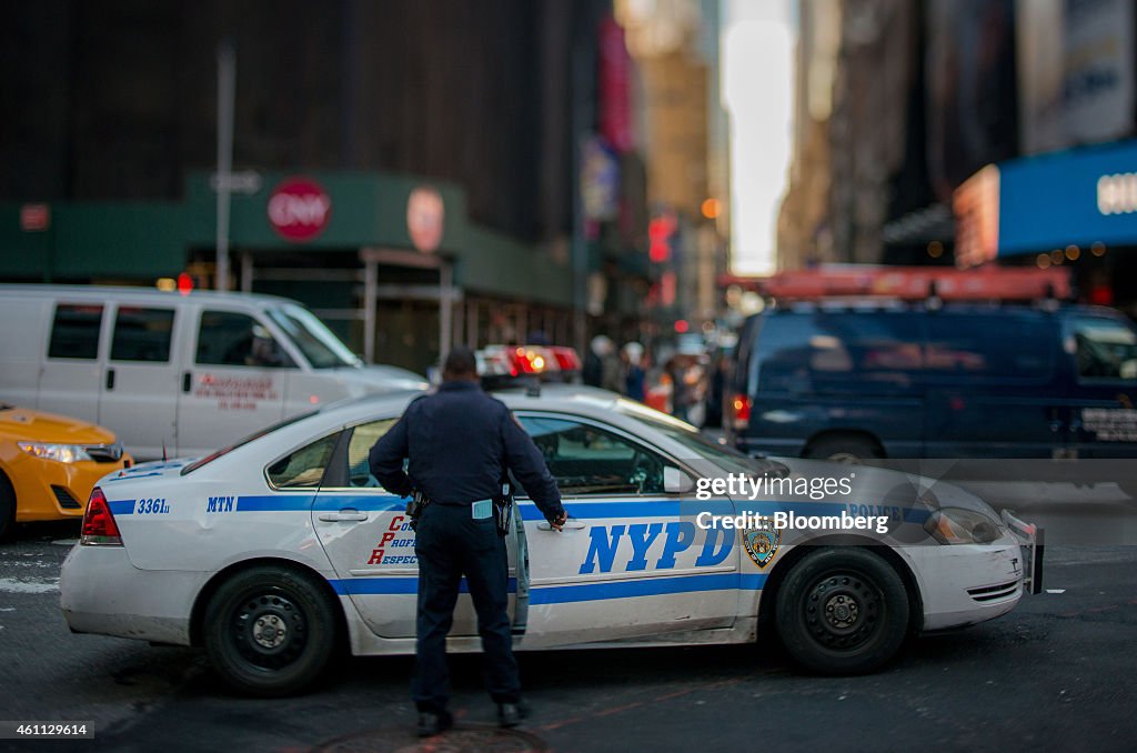 NYPD Officers And FDNY Members As Police Are Redeployed In Response To Paris Attack
