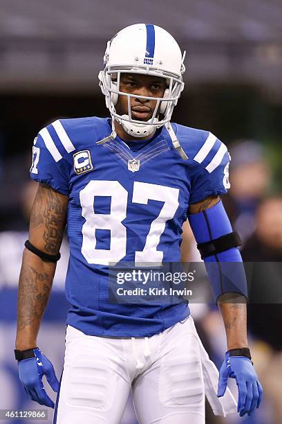 Reggie Wayne of the Indianapolis Colts warms up prior to the start of the game against the Cincinnati Bengals on January 4, 2015 at Lucas Oil Stadium...