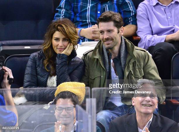 Jennifer Esposito and guest attend the Columbus Blue Jackets vs New York Rangers game at Madison Square Garden on January 6, 2014 in New York City.