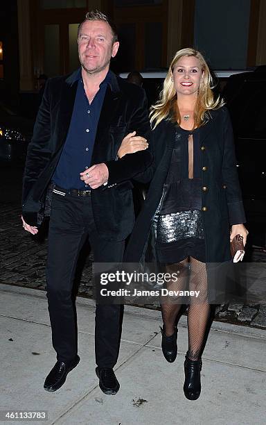 Renny Harlin and Erika Marchino seen on the streets of Manhattan on January 6, 2014 in New York City.