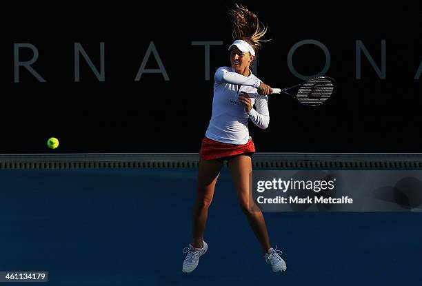 Olivia Rogowska of Australia hits a forehand in her second round match against Bojana Jovanovski of Serbia during day three of the Moorilla Hobart...