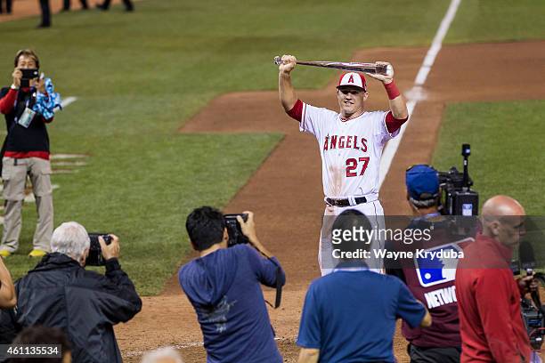 American League All-Star Mike Trout of the Los Angeles Angels of Anaheim holding up the MVP award after the game vs National League in the 85th MLB...