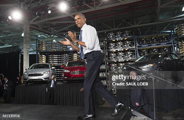 President Barack Obama arrives to speak about the automotive manufacturing industry at the Ford Michigan Assembly Plant in Wayne, Michigan, January...