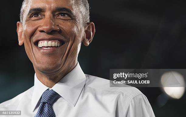 President Barack Obama speaks about the automotive manufacturing industry at the Ford Michigan Assembly Plant in Wayne, Michigan, January 7, 2015....