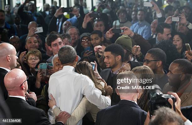 President Barack Obama greets guests after speaking about the automotive manufacturing industry at the Ford Michigan Assembly Plant in Wayne,...