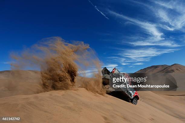 Giniel De Villiers of South Africa and Dirk Von Zitzewitz of Germany for Toyota Imperial Team South Africa in the Pick Up Hilux compete during day 4...