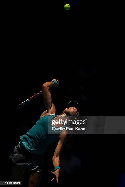 Eugenie Bouchard of Canada serves in her singles match against Flavia Pennetta of Italy during day five of the 2015 Hopman Cup at Perth Arena on...