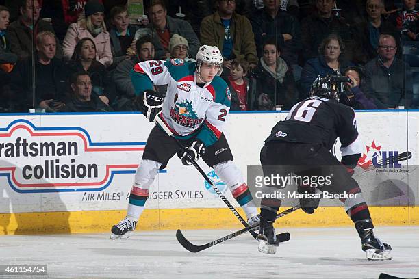 Leon Draisaitl of Kelowna Rockets looks for the pass against the Vancouver Giants on January 7, 2015 at Prospera Place in Kelowna, British Columbia,...