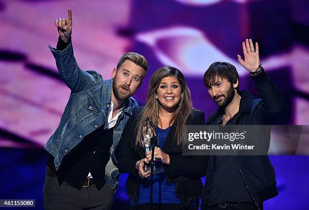 Musicians Charles Kelley, Hilary Scott and Dave Haywood of Lady Antebellum accept the Favorite Country Group award onstage at The 41st Annual...