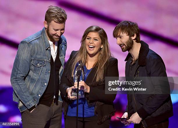 Musicians Charles Kelley, Hilary Scott and Dave Haywood of Lady Antebellum accept the Favorite Country Group award onstage at The 41st Annual...