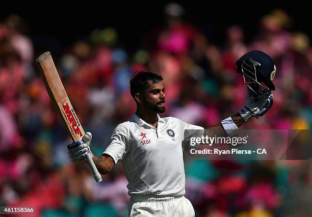 Virat Kohli of India celebrates after reaching his century during day three of the Fourth Test match between Australia and India at Sydney Cricket...