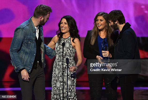 Musicians Charles Kelley, Hilary Scott and Dave Haywood of Lady Antebellum accept the award for Favorite Country Group onstage with actress Lisa...