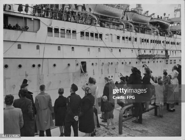 Dutch displaced persons returning from Japanese concentration camps following World War Two, Netherlands, circa 1945.