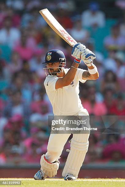 Virat Kohli of India plays a cover drive during day three of the Fourth Test match between Australia and India at Sydney Cricket Ground on January 8,...