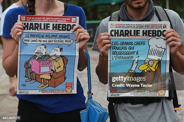 During a vigil for victims of the Paris massacre at Federation Square on January 8, 2015 in Melbourne, Australia. Members of the French community...