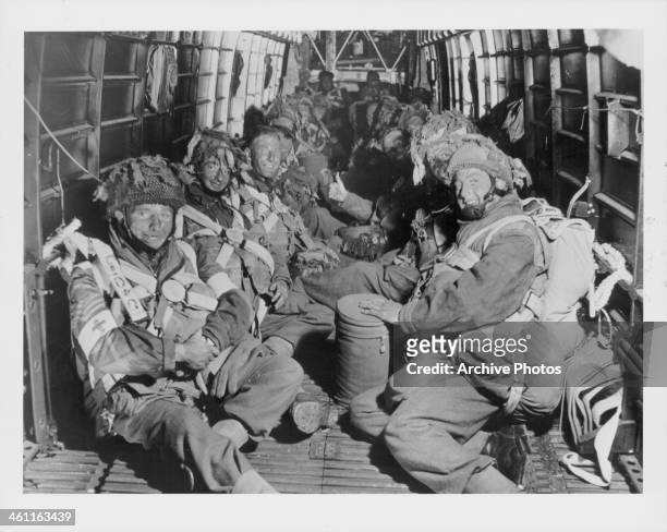 British paratroops of the 6th Airborne Division aboard an aircraft en route to their drop site during the D-Day Invasion of Normandy, World War II,...