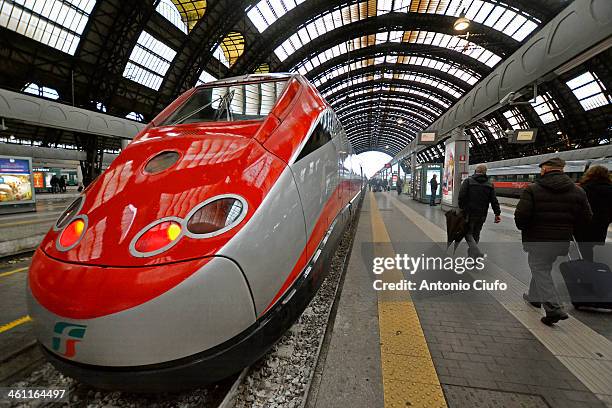 Train Trenitalia "Frecciarossa" in Milan Central Station. 2013 for Trenitalia closes with over 42 million passengers while only in the period of the...