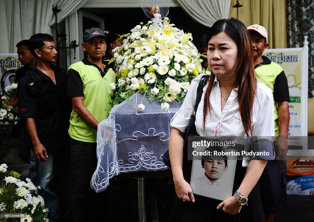 Funerals Held For Victims Of AirAsia Plane Crash