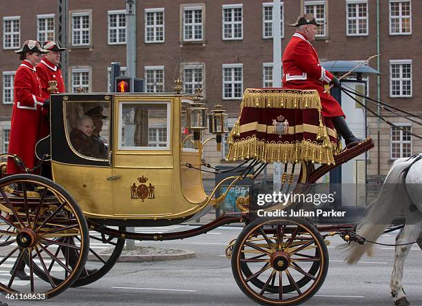 Queen Margrethe of Denmark and Prince Henrik of Denmark depart in the Golden Carriage from the New Year's Levee held by Queen Margrethe of Denmark...