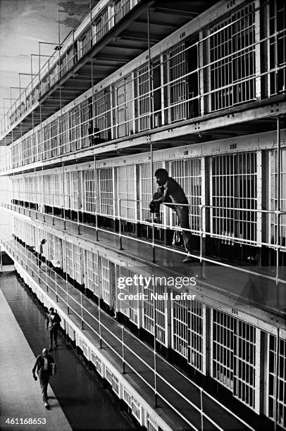 The Inmate Nation: View of inmates along cell block at United States Penitentiary Leavenworth. Leavenworth, KS 7/1/1982 - 7/31/1982 CREDIT: Neil...