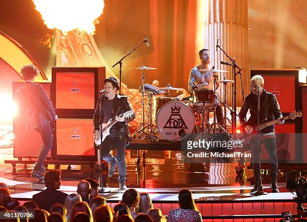 Joe Trohman, Andy Hurley, Patrick Stump and Pete Wentz of Fall Out Boy perform onstage during The 41st Annual People's Choice Awards held at Nokia...
