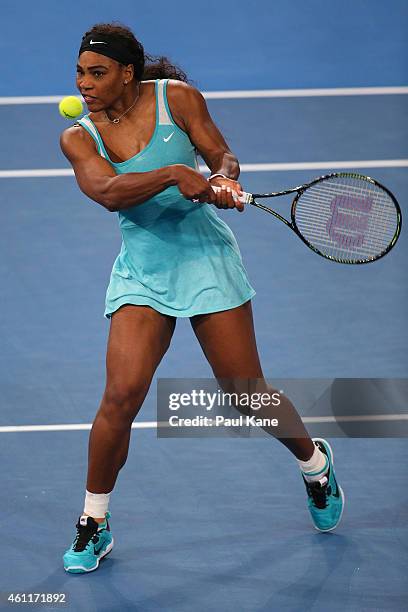 Serena Williams of the United States plays a backhand in her singles match against Lucie Safarova of the Czech Republic during day five of the 2015...