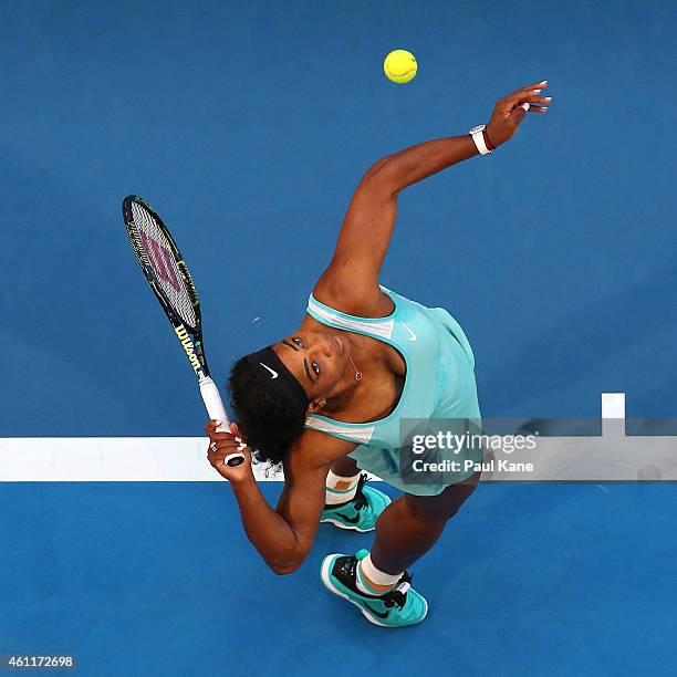 Serena Williams of the United States serves in her singles match against Lucie Safarova of the Czech Republic during day five of the 2015 Hopman Cup...