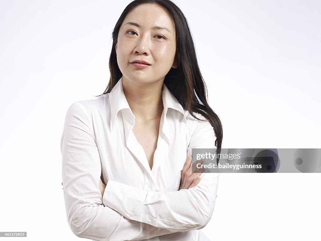 Woman with arms crossed, portrait