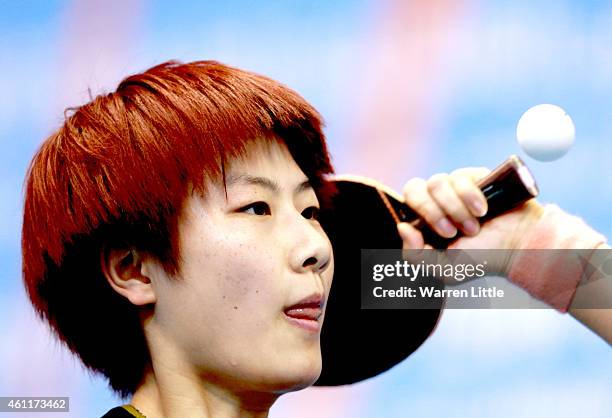 Ding Ning of China in action against Michelle Beaumont of Australia during the Women's Group 1 match on day one of the ITTF World Team Cup at the Al...