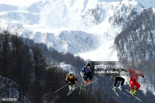 Armin Niederer of Switzeland leads during the Freestyle Skiing Men's Ski Cross 1/8 Finals on day 13 of the 2014 Sochi Winter Olympic at Rosa Khutor...