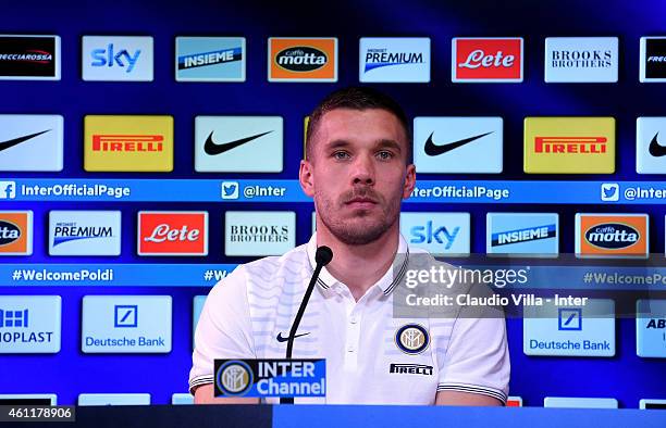 New signing for FC Internazionale Lukas Podolski speaks to the media during a press conference at Appiano Gentile on January 8, 2015 in Como, Italy.