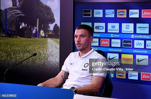 New signing for FC Internazionale Lukas Podolski speaks to the media during a press conference at Appiano Gentile on January 8, 2015 in Como, Italy.