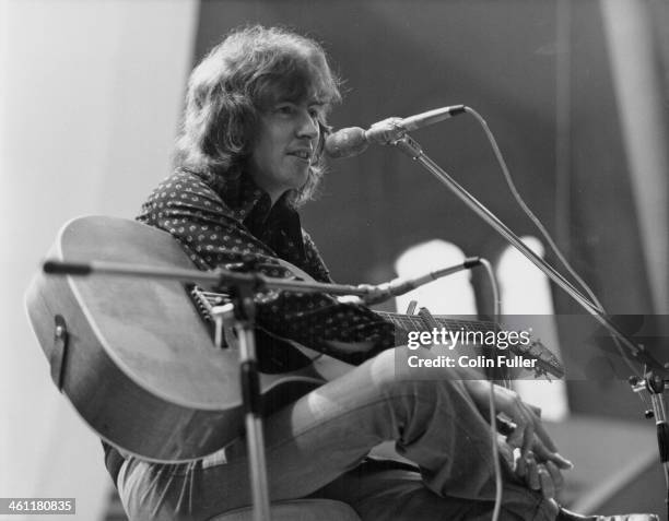 Scottish musician Al Stewart performing, circa 1970.