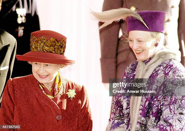 Queen Elizabeth II greets Danish Queen Margrethe of Denmark at Windsor Castle on February 16, 2000 in Windsor, England .