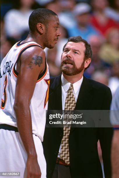 Golden State Warriors head coach PJ Carlesimo and Donyell Marshall talk circa 1998 at the Arena in Oakland in Oakland, California. NOTE TO USER: User...