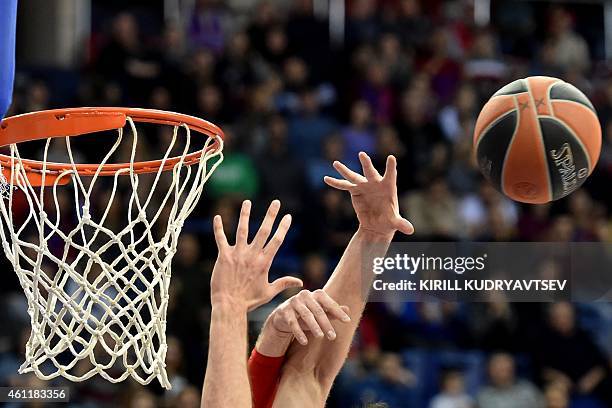 Moscow's player Andrey Vorontsevich fight for the ball with Laboral Kutxa Vitoria's player Mirza Begic during their Euroleague Top-16 group F...