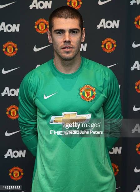 Victor Valdes of Manchester United poses after signing for the club at Aon Training Complex on January 8, 2015 in Manchester, England.