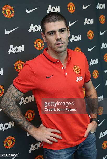 Victor Valdes of Manchester United poses after signing for the club at Aon Training Complex on January 8, 2015 in Manchester, England.