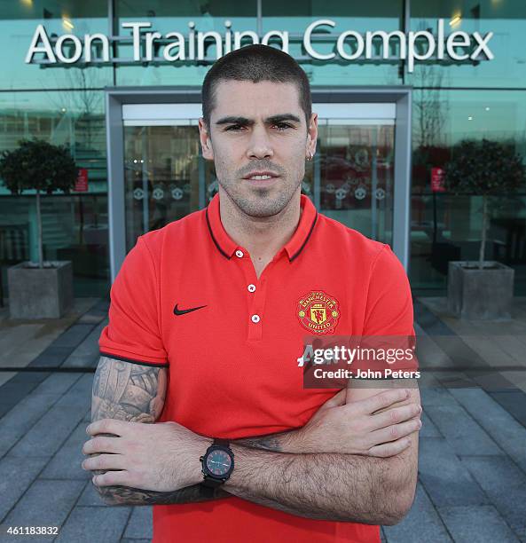 Victor Valdes of Manchester United poses after signing for the club at Aon Training Complex on January 8, 2015 in Manchester, England.